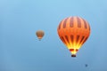 Hot Air Balloons With Fire Light Flying In Blue Sky, Travel