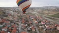 Hot Air Balloons flying over a city