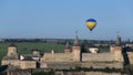 Hot air balloons flying over the fortress