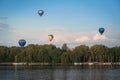 Hot-air Balloons flying over Lake Galve - Trakai, Lithuania Royalty Free Stock Photo