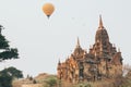 Hot air balloons flying over pagodas at Bagan temple complex, Myanmar Royalty Free Stock Photo