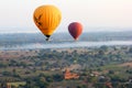 Hot air balloons flying over plain of Bagan, Myanmar