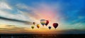 Hot air balloons flying over the sunrise mountain at phucheefa mountain. Chiang Rai Province, Thailand Royalty Free Stock Photo