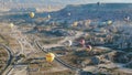 Hot air balloons flying over the valleys of Cappadocia, Turkey