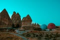 Hot air balloons are getting ready to fly at sunrise in Cappadocia Turkey Royalty Free Stock Photo