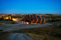 Hot air balloons are getting ready to fly at sunrise in Cappadocia Turkey Royalty Free Stock Photo