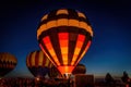 Hot Air Balloons Glowing In Night Sky
