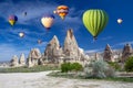 Hot air balloons over the cave town, Valley of Daggers, Cappadocia, Turkey