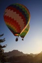 Hot air balloons over karst hills along Nam Song Xong river, Vang Vieng, Laos Royalty Free Stock Photo
