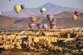 Hot air balloons over mountain landscape in Cappadocia, Goreme National Park, Turkey Royalty Free Stock Photo