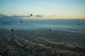 Hot air balloons over mountain landscape in Cappadocia, Goreme National Park, Turkey. Aerial view from air balloon Royalty Free Stock Photo