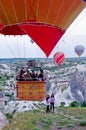 Hot air balloons over mountain landscape in Cappadocia Royalty Free Stock Photo