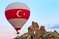 Hot air balloons over mountain landscape in Cappadocia, Turkey Royalty Free Stock Photo