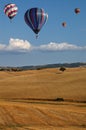 Hot-air Balloons over Tuscan Landscape Royalty Free Stock Photo