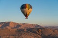 Hot air Balloons over Valley of the King in Luxor city in a morning sunrise, Upper Egypt Royalty Free Stock Photo