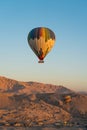 Hot air Balloons over Valley of the King in Luxor city in a morning sunrise, Upper Egypt Royalty Free Stock Photo