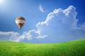 Hot air balloons rise up into blue sky to new moon Royalty Free Stock Photo