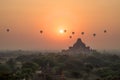 Hot air balloons at sunrise at Bagan temple, Burma, Myanmar