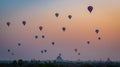 Hot air balloons at sunrise over the pagodas and temple area Royalty Free Stock Photo