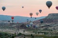 Hot air balloons take off before sunrise near the Goreme in the Cappadocia, Turkey Royalty Free Stock Photo