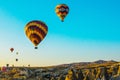 Hot air balloons take off at sunrise over Cappadocia, Goreme, Turkey