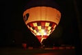 Hot air baloon starting to fly in the evening sky Royalty Free Stock Photo