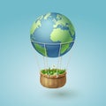 Hot air the earth balloon with a grass basket, world sustainable environment concept and ecology idea