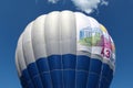 Hot air flying balloon on blue sky Royalty Free Stock Photo