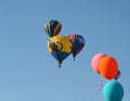 Hot Air Rat balloon with a bunch of helium balloons