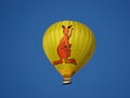 A hot air tourist balloon moving gently across the sky in tropical Queensland