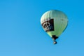 Hot airballoon in clear blue sky in the Netherlands