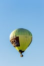 Hot airballoon in clear blue sky in the Netherlands