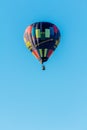 Hot airballoon in clear blue sky