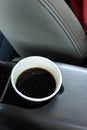 Hot Americano coffee in take away cup in car Royalty Free Stock Photo