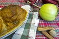 Hot apple dumplings in pan with Granny Smith apples and spices