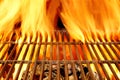 Hot BBQ Grill and Burning Charcoals with Bright Flame Royalty Free Stock Photo