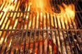 Hot BBQ Grill and Burning Charcoals with Bright Flame Royalty Free Stock Photo
