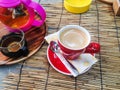 Black coffee hot red glass was placed on the table as the background. Royalty Free Stock Photo