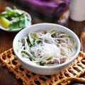 Hot bowl of pho with beef and rice noodles Royalty Free Stock Photo