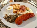 Hot Breakfast Plate with Sausage, Fried Egg , Bacon and Toast Bread / English Style