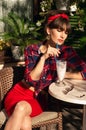 Hot brunette woman with a cocktail Royalty Free Stock Photo