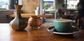 Hot cappuccino on a table inside a coffee shop. Royalty Free Stock Photo