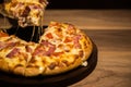 Hot cheese pizza in dinner light on wood table Royalty Free Stock Photo