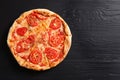 Hot cheese pizza Margherita on wooden table, top view. Royalty Free Stock Photo