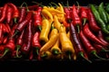 Hot chili peppers background. Red, yellow and green chilli peppers. Royalty Free Stock Photo