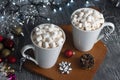 Hot Chocolate or Cocoa with Marshmallows and Festive Christmas Decorations Royalty Free Stock Photo