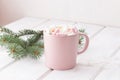 Hot chocolate coffee, cocoa with marshmallows in a pink mug