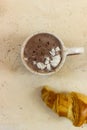Hot chocolate coffee in a cup on a beige background Royalty Free Stock Photo