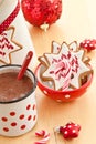 Hot chocolate and colorful decorated christmas cookies