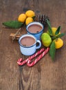 Hot chocolate in enamel metal mugs, fresh